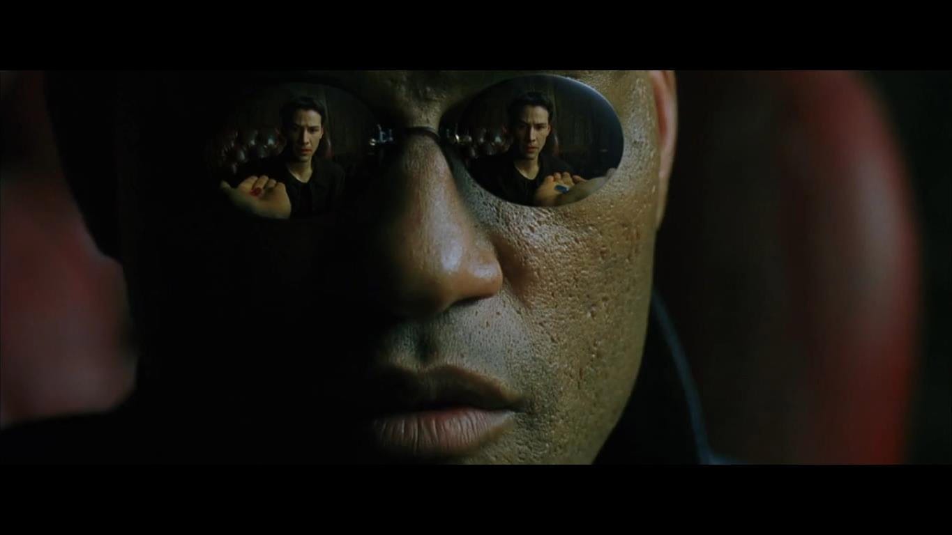 Morpheus presenting the option of the red-pill and the blue-pill to Neo